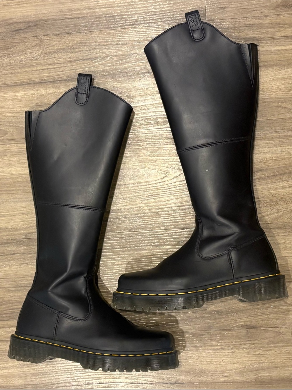 Dr. Martens Black Tall Leather Moto Boots with Yellow Welt